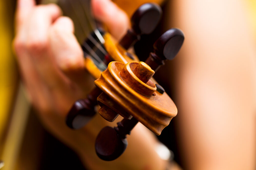 Girl playing the violin classical music, detail, Macro, studio lighting